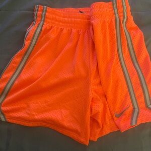 Nike Vibrant Orange Mesh Shorts with Silver Stripes